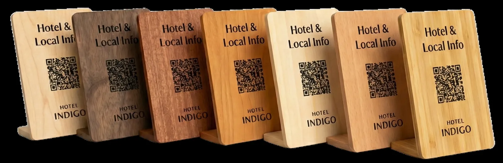 Seven wooden QR stands side by side, each in a different timber from pale to dark